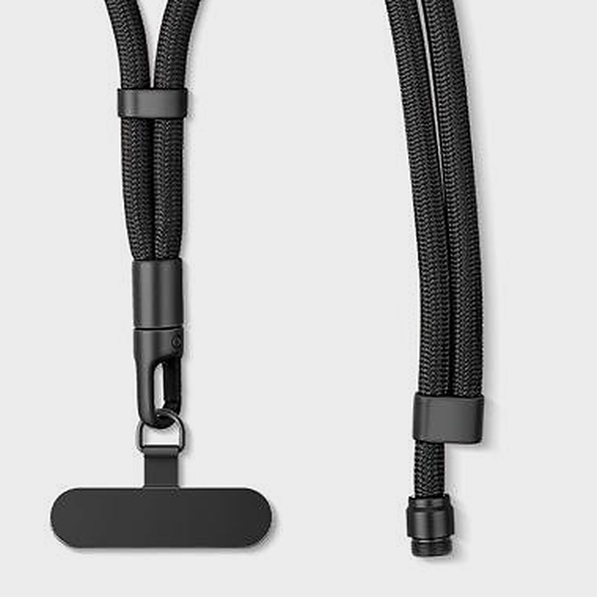 Close-up of the threaded locking buckle, rotating connector and T-patch on the Y307 phone lanyard