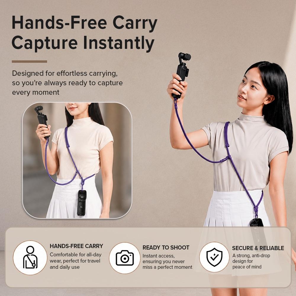 Y379 hands-free carry: a model wearing the braided lanyard cross-body with a pocket gimbal camera held ready to shoot