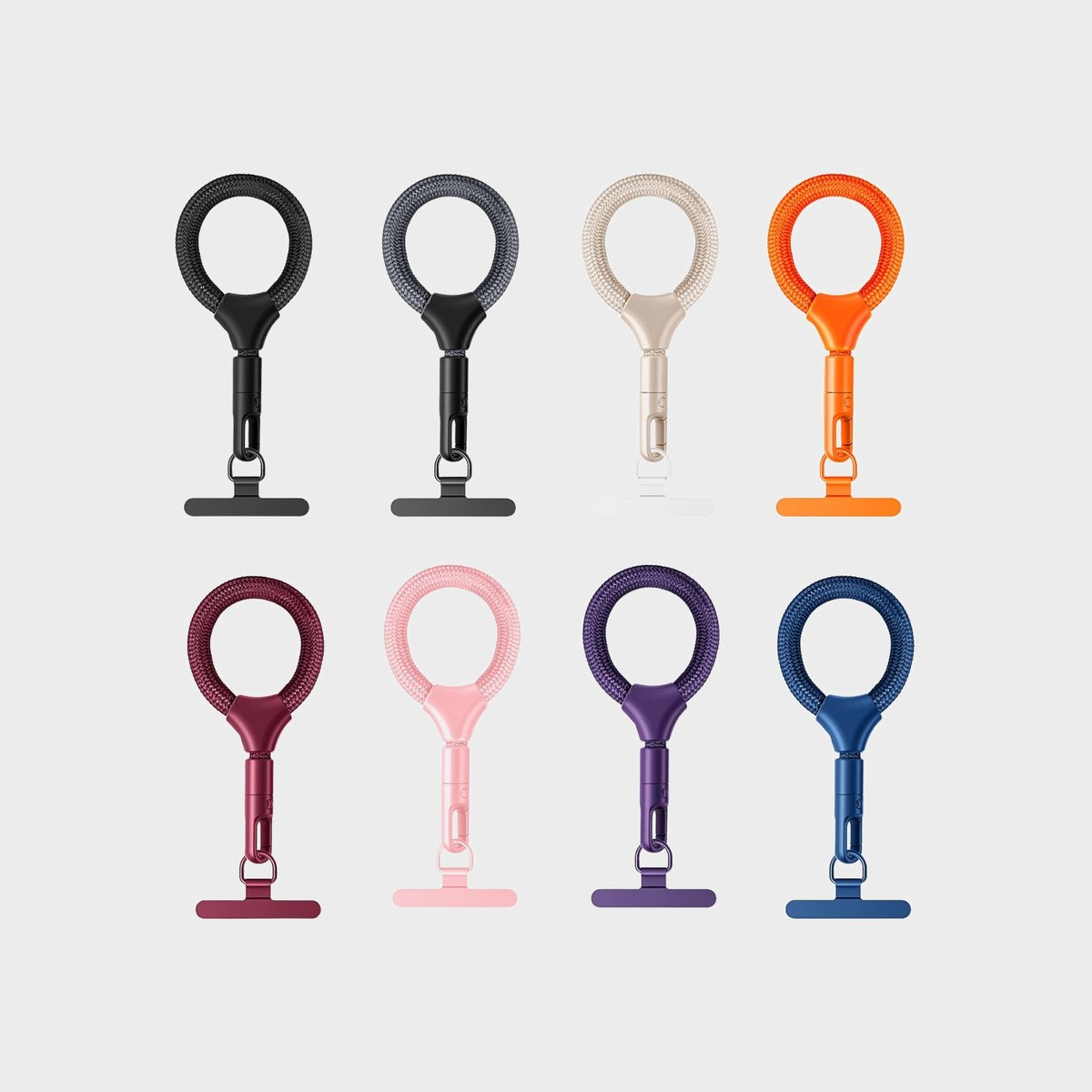 Ocho colores de la mini correa anti-pérdida Y003 para teléfono mostrados uno junto a otro