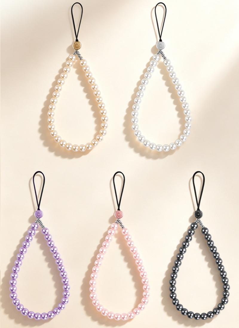 Y097 beaded pearl wrist charms in champagne, white, purple, pink and grey laid out in two rows