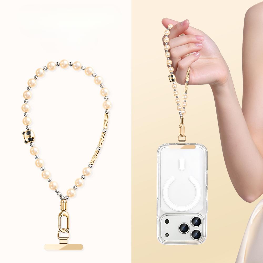Y405 panda and bamboo pearl phone wrist charm in champagne with stepped clip attached to a phone